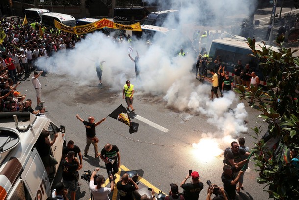 Taxi drivers hold a protest during a strike against what they say is unfair competition from ride-ha