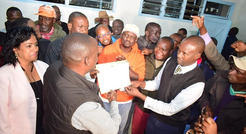 Imran Okoth receiving the ODM nomination certificate