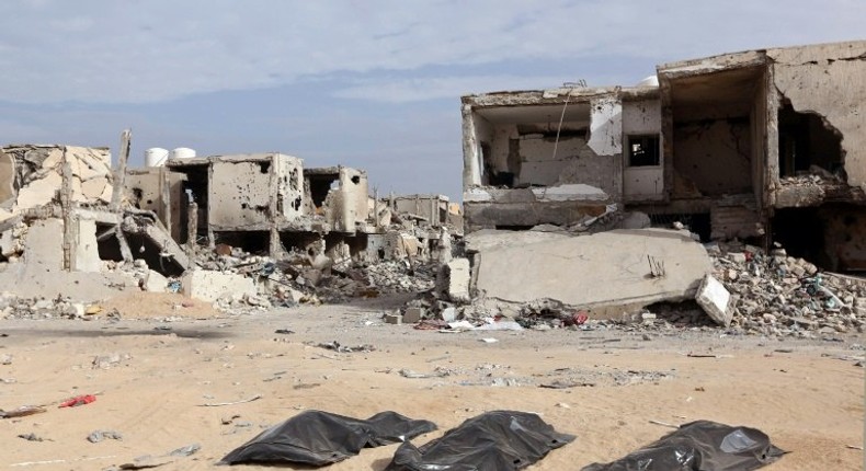 Body bags on the ground after being pulled from rubble by the Libyan Red Crescent in Sirte, on December 20, 2016