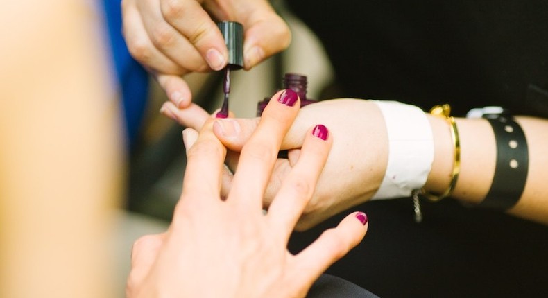 19. Having a manicure.