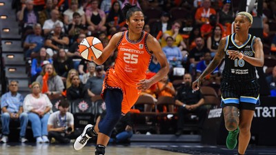 Alyssa Thomas dribbles the ball up the floor.Erica Denhoff/Icon Sportswire via Getty Images