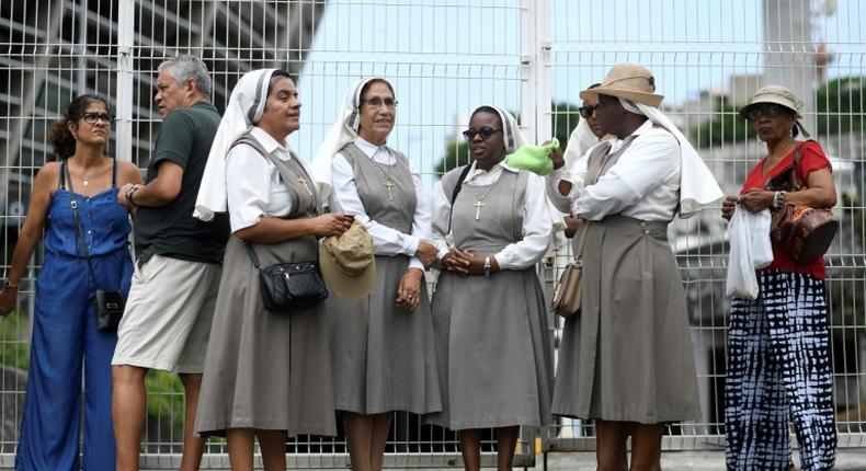 Nuns queue for the canoninization ceremony of Brazil's first female saint in Salvador, Bahia, October 20, 2019