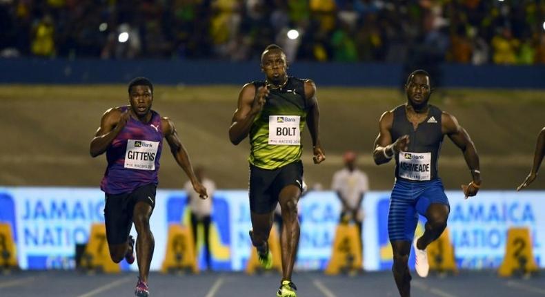 Usain Bolt ran in front of a sea of green and yellow clad Jamaican fansand cruised to victory in a time of 10.03, well below his world record time but good enough to beat a solid field that included runner-up Javaughn Minzie of Jamaica