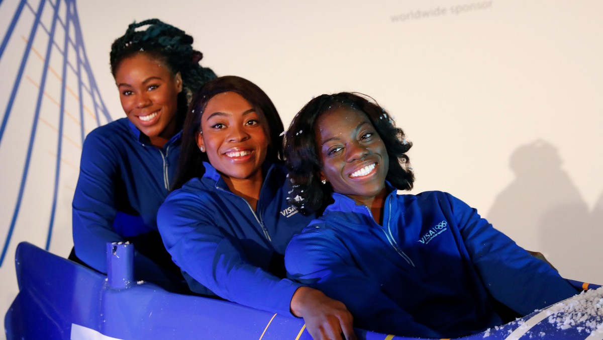 Seun Adigun, Ngozi Onwumere and Akuoma Omeoga, members of the Nigerian Women's Bobsled Team, pose du