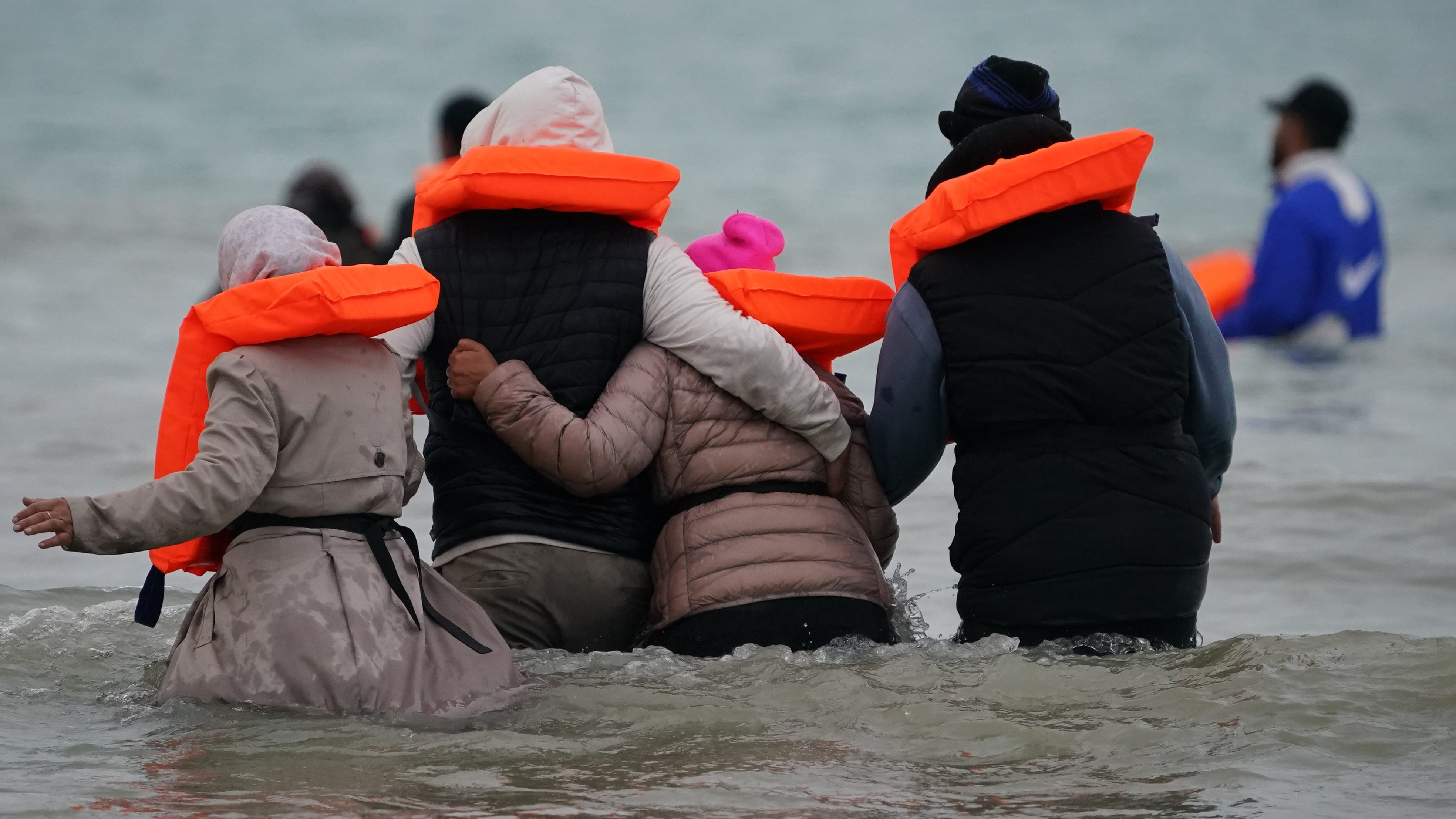 UK returns 75 migrants to France - one re-enters after a month