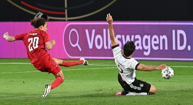 Denmark forward Yussuf Poulsen (L) scores the equaliser against Germany Creator: Federico GAMBARINI