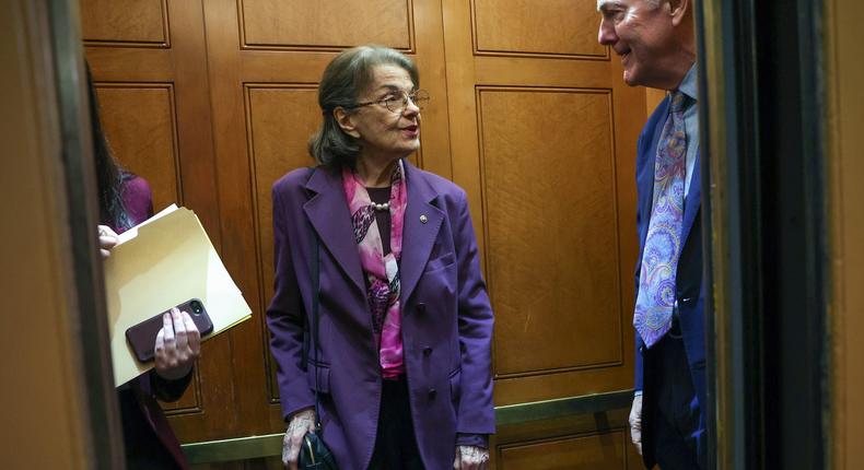 Democratic Sen. Dianne Feinstein of California talks to Republican Sen. John Cornyn of Texas while sharing an elevator at the US Capitol on February 16, 2023 in Washington, DC.Kevin Dietsch/Getty Images