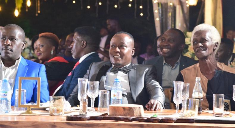 Joseph kabuleta in the middle on his 50th birthday party