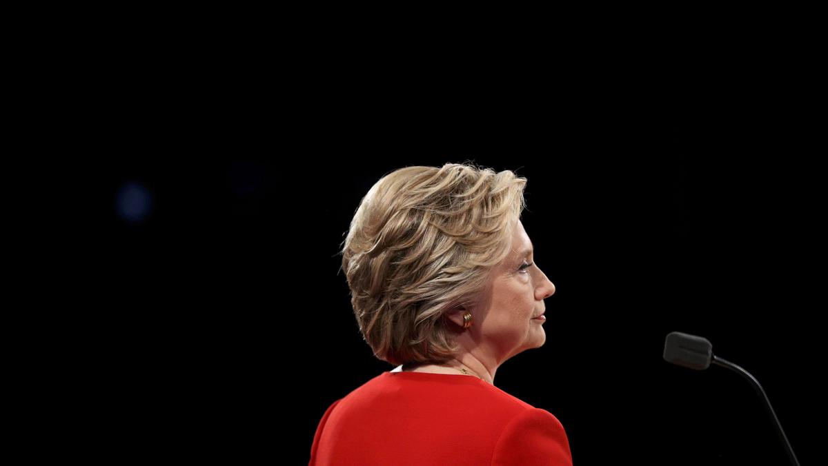 Democratic U.S. presidential nominee Hillary Clinton pauses during the first presidential debate wit