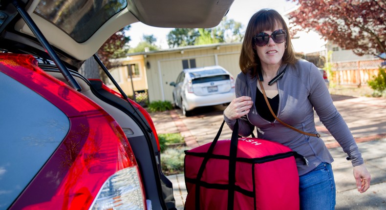 Delivery gig work isn't as lucrative as it was in 2020, gig workers told Business Insider.Jessica Christian/The San Francisco Chronicle via Getty Images