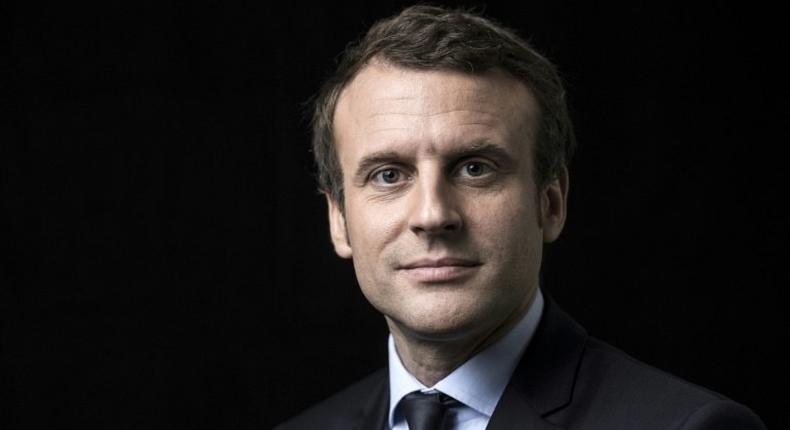 French presidential election candidate for the En Marche movement Emmanuel Macron poses for a photo session on March 7, 2017 at his campaign headquarters in Paris