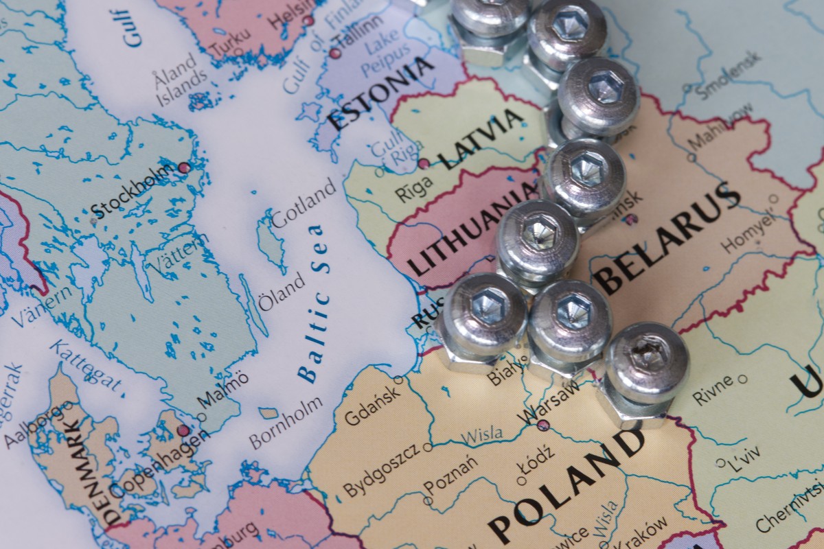 A,Wall,Made,Of,Nuts,And,Bolts,On,The,Borders