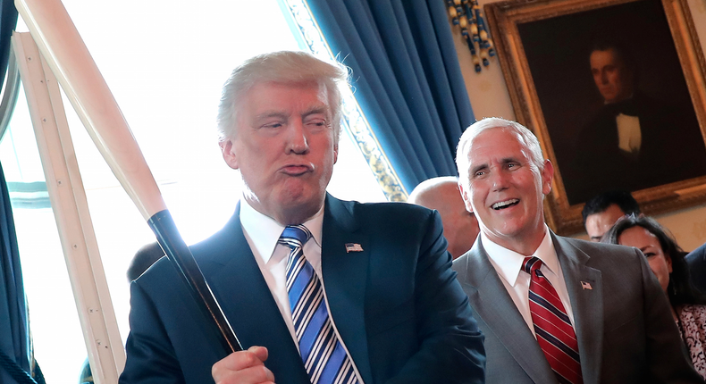 Vice President Mike Pence with President Donald Trump at a Made in America product showcase event at the White House.