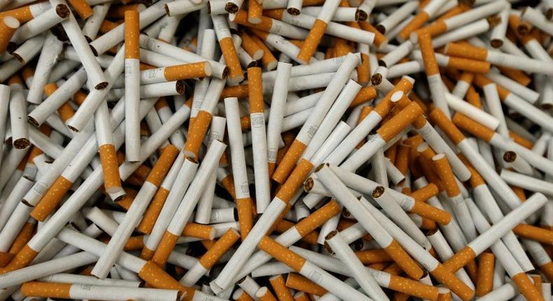 Cigarettes are seen during the manufacturing process in the British American Tobacco Cigarette Factory (BAT) in Bayreuth, southern Germany, April 30, 2014.  REUTERS/Michaela Rehle