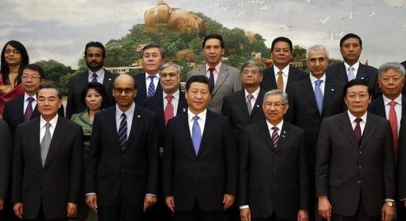 Chinese President Xi Jinping with delegates at the signing ceremony of the Asian Infrastructure Investment Bank in Beijing in October 2014.