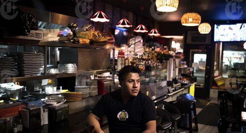 Ceasar Rodriguez at his family's restaurant, Tamales Martita, which has seen a decrease in business recently, in New York, Feb. 22, 2017. Rodriguez, who was brought to New York when he was 13 and has temporary protection from deportation under the DACA program, said he thinks local undocumented residents are saving their money in case they get detained or deported. 