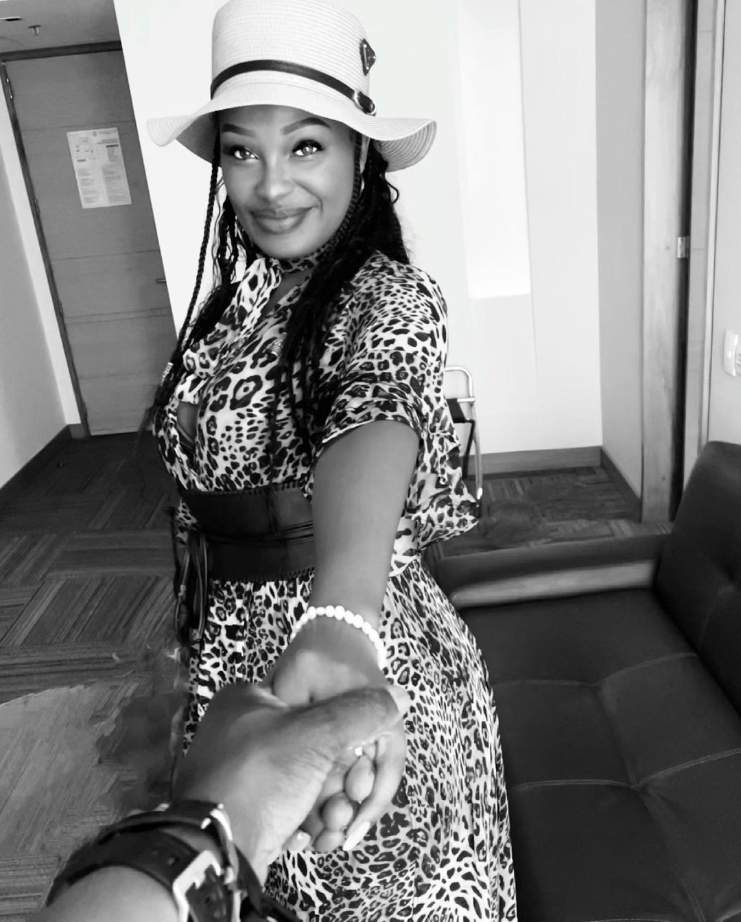 Maureen Waititu holding hands with her new Man