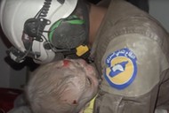 Rescue volunteer bursts into tears after rescuing a baby girl caught in Assad bombings