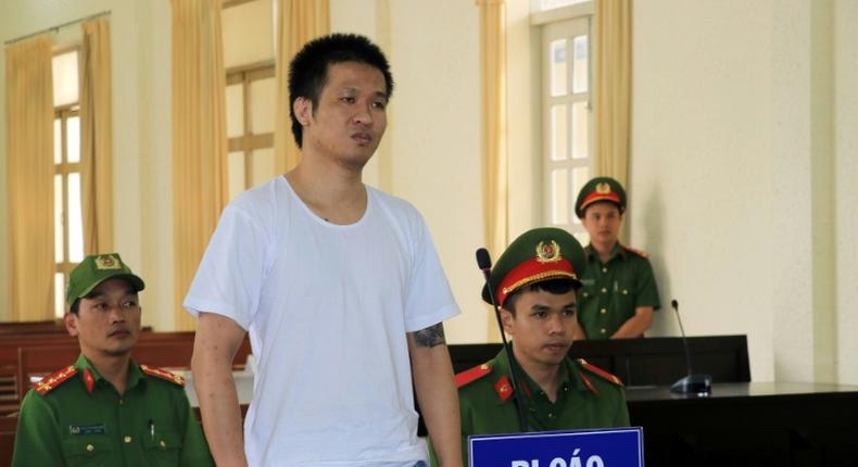 Nguyen Quoc Duc Vuong appears during a trial in Vietnam's Lam Dong province on accusations of humiliating the country's leaders