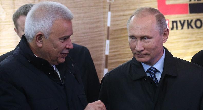 Former Lukoil President Vagit Alekperov, who pocketed the most dividends from January 2023 to March 2024, and Russian President Vladimir Putin.Mikhail Svetlov/Getty Images