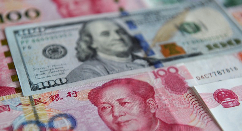 China is playing defense more than offense in its promotion of the the Chinese yuan internationally.Sheldon Cooper/SOPA Images/LightRocket/Getty Images