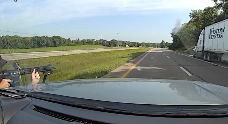 Body camera footage shows an Ohio state trooper with his gun pointed at the truck Jadarrius Rose was driving on July 4..Ohio State Highway Patrol