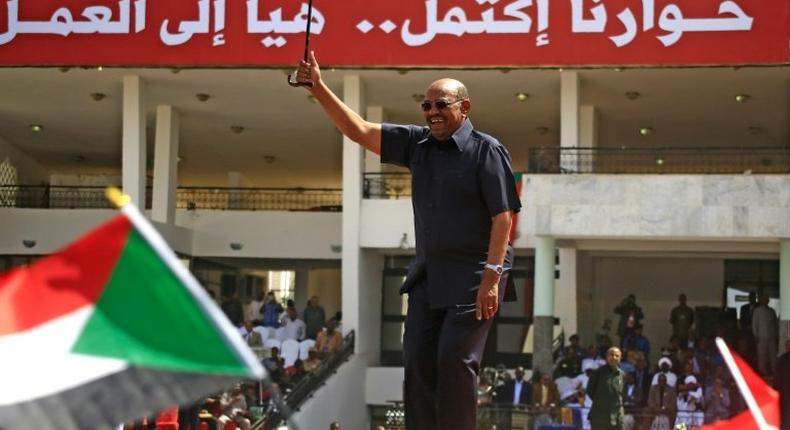 Sudanese President Omar al-Bashir (C) vowed to crush any new anti-regime protests as the authorities did three years ago