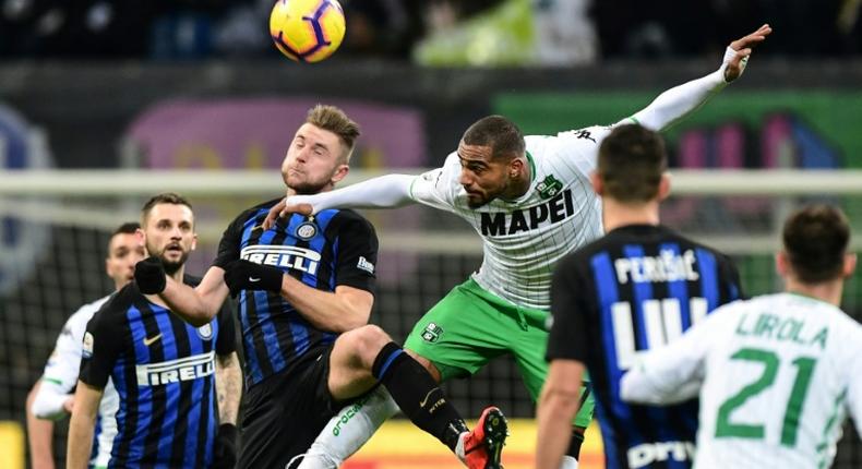 Boateng (R) challenges for a high ball during Sassuolo's draw away to Inter in Serie A at the weekend