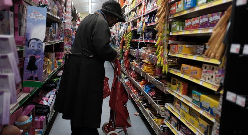 A shopper at a dollar store in Brooklyn.Spencer Platt/Getty Images