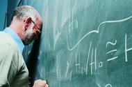 Portrait of a Frustrated Maths Lecturer Banging his Head Against a Blackboard