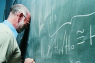 Portrait of a Frustrated Maths Lecturer Banging his Head Against a Blackboard