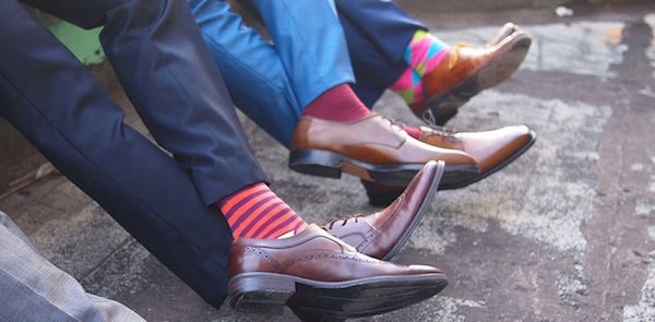 Wear socks that closely match your pants instead of happy socks (Courtesy)