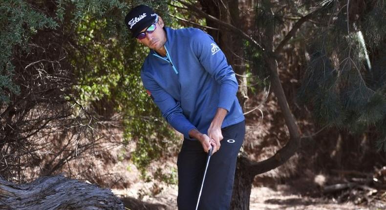 Rafa Cabrera Bello of Spain putts during the first day of the World Cup of Golf on the Kingston Heath course in Melbourne on November 24, 2016