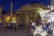 Pantheon at night with open restaurants