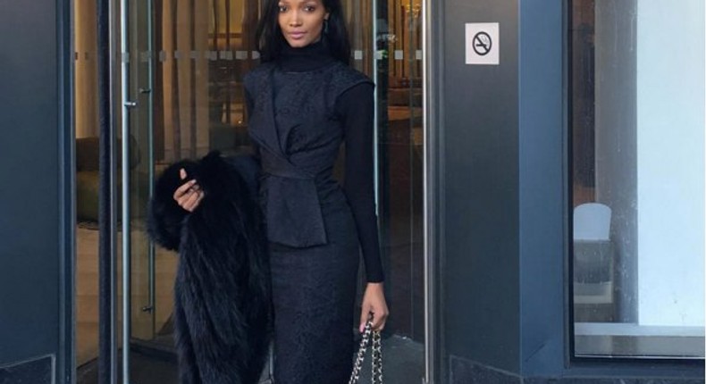 Millen Magese in an all black ensemble