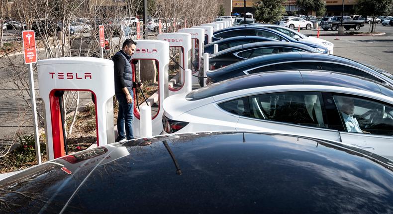 Tesla cars charge at a Supercharger station in Irvine, California.MediaNews Group/Orange County Register / Getty Images