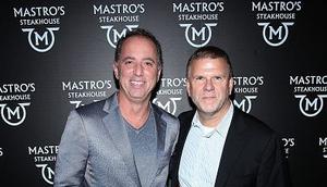 CEO of Jefferies Rich Handler (left) and CEO of Mastro's Restaurants Tilman Fertitta (right) attend the Mastro's Steakhouse Grand Opening Celebration on November 11, 2014 in New York City.Rob Kim/Getty Images