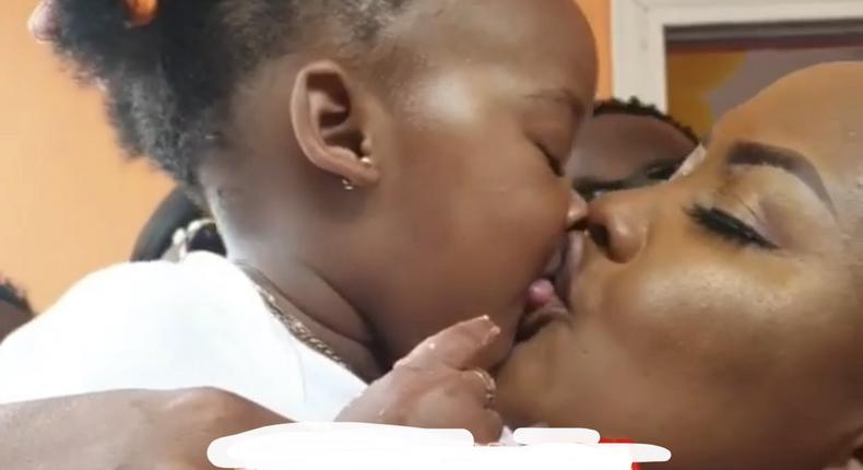 Nana Ama McBrown kisses Baby Maxin