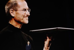 Apple's Tim Cook speaks during a product launch event in Cupertino