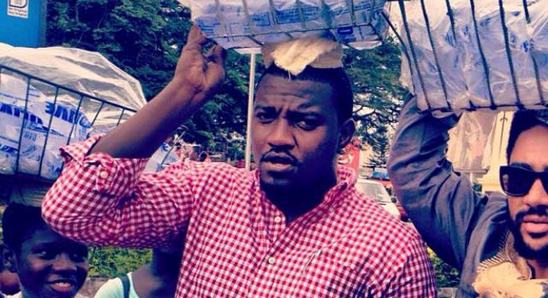 John Dumelo & Majid Michel selling pure water