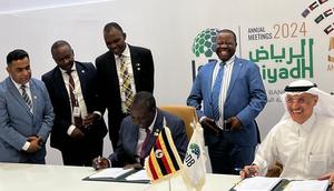 Matia Kasaija signed the loan deal on behalf of Uganda