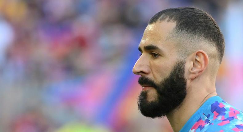 Real Madrid striker Karim Benzema has been handed down a tougher than expected one-year suspended sentence for complicity in a bid to blackmail his former France team-mate Mathieu Valbuena Creator: LLUIS GENE