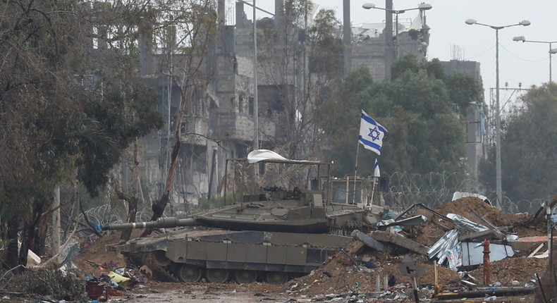 An Israeli tank near Gaza City on November 27.REUTERS/Ibraheem Abu Mustafa