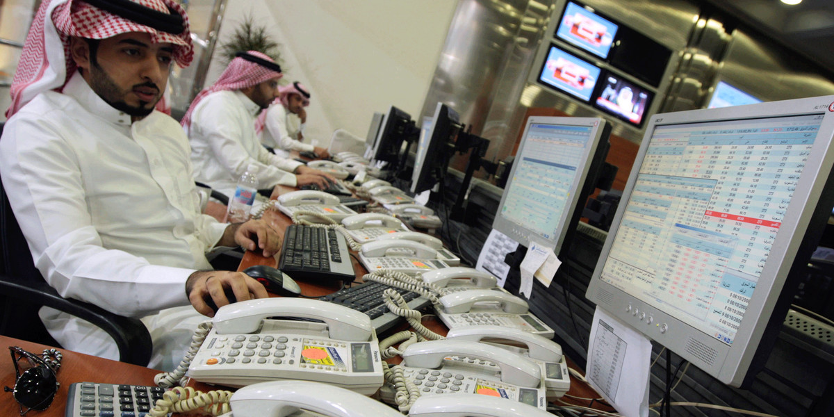Saudi traders monitoring stocks at the Saudi Investment Bank in Riyadh.