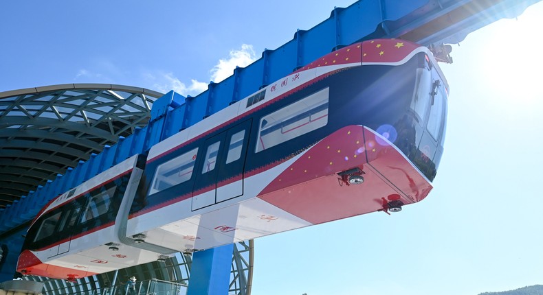 China's Red Rail air train glides through the air without touching the track above it or anything below.Photo by VCG/VCG via Getty Images