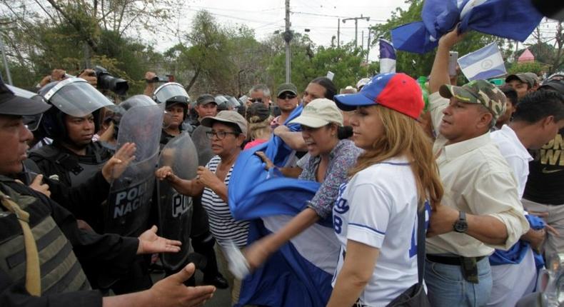 Nicaragua police prevented buses and trucks carrying protesters from converging in the town of Juigalpa, east of Managua as farmers tried to demonstrate against a planned canal