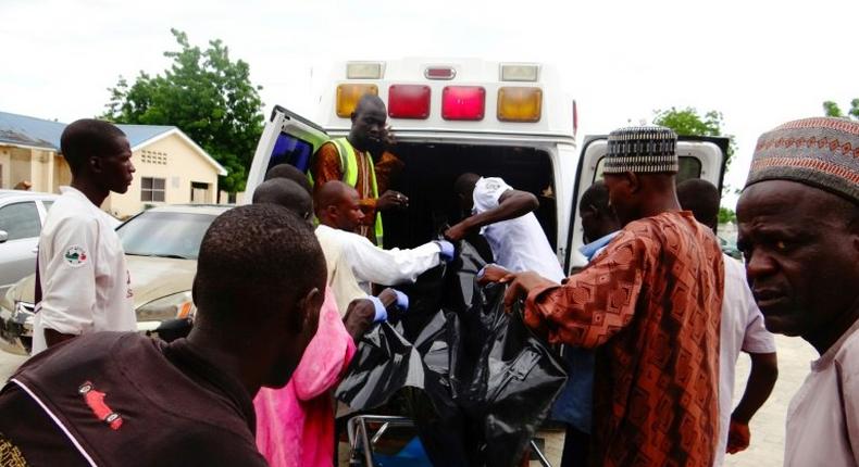 A victim is brought to the State Specialist Hospital in Maiduguri, northeastern Nigeria on July 29, 2017