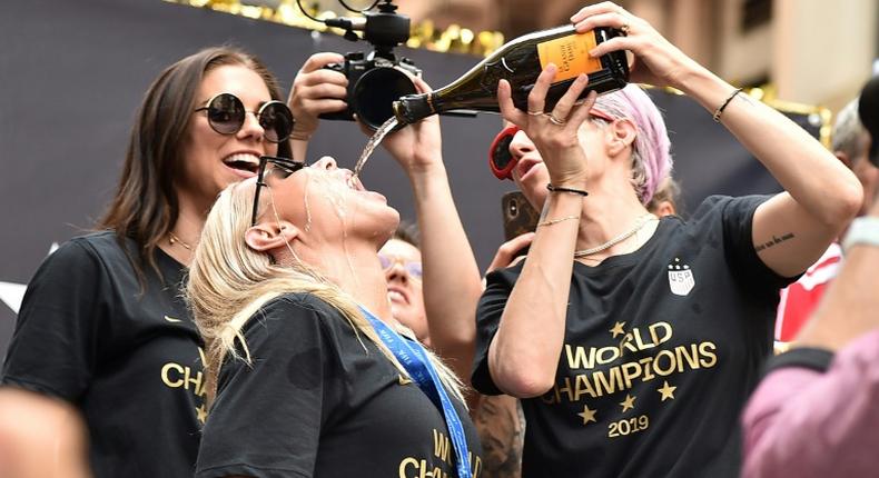 US Women's World Cup players celebrating during a victory parade in New York will have better conditions around matches under terms of a settlement deal