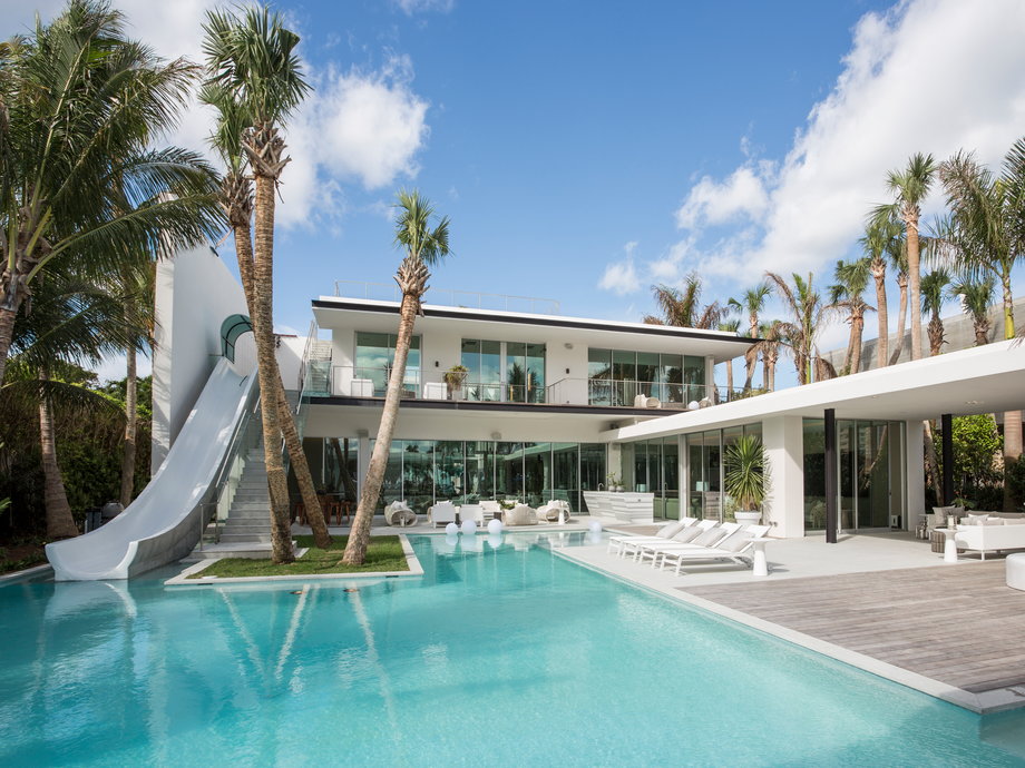 In the heart of Miami Beach lies Pine Tree House, a brand-new spec home with its very own two-story water slide attached to the house. The $34 million property houses six bedrooms in its 13,500 square feet, and it also has 100 feet of water frontage onto Indian Creek Canal.