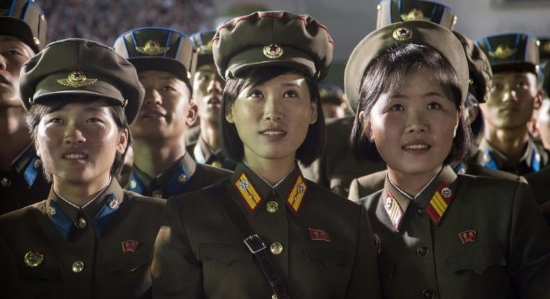 Soldiers watched a firework display in Pyongyang to celebrate the launch of North Korea's first ICBM